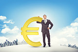 Businessman leaning on euro sign