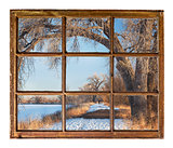 winter park scene from old cabin window