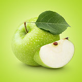 Green apple with leaf and slice