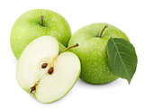 Green apples with leaf and half isolated on a white