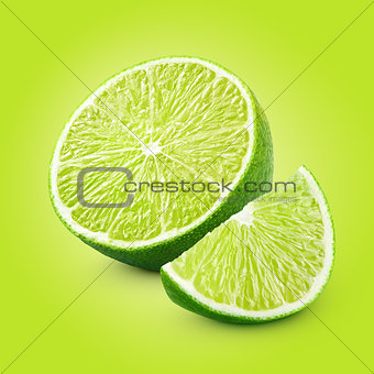 Half and slice of lime citrus fruit