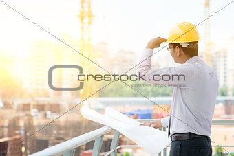Asian Indian male site contractor engineer on site