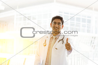 Asian Indian medical doctor thumb up