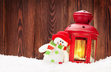 Christmas candle lantern and snowman toy