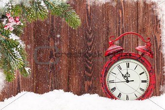Christmas fir tree and alarm clock