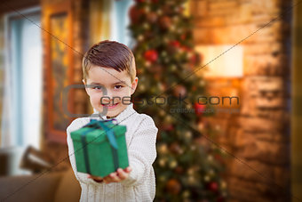 Mixed Race Boy with Christmas Tree Handing Gift Out Front