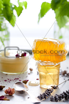 Honey variety, honeycomb in a glass jars .