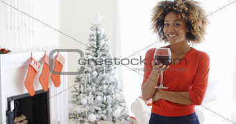Young woman offering a Christmas toast