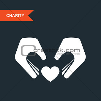 Charity and guardianship concept - hands with heart