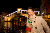 Young elegant woman spending Christmas time in Venice, Italy