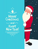 Smiling Santa Claus wearing red hat and glasses holds a banner with merry chrismas