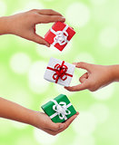Set of small presents in child hands
