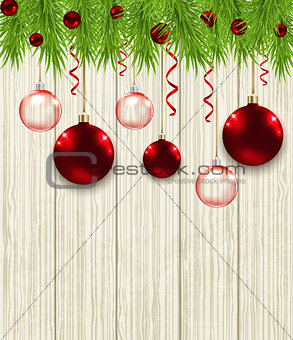 Green fir branches and red baubles