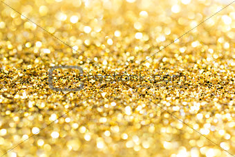 Gold abstract glitter background with copy space