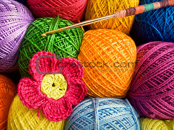Crochet hook with a ball of yarn