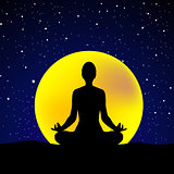 Silhouette of woman practicing yoga at night sky background