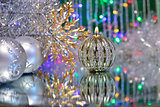 Christmas decorations with candle and silver balls.