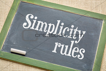 simplicity rules  blackboard sign