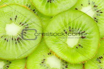 Many slices of kiwi fruit.
