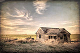 abandoned homestead on prairie