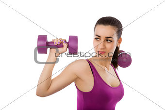 Beautiful girl with dumbbells isolated.