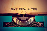 retro typewriter and text once upon a time