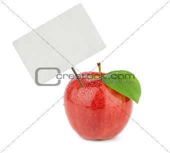 Ripe red apple with price tag