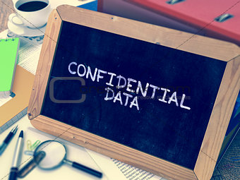 Confidential Data - Chalkboard with Hand Drawn Text.