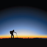 Hiking man and sunrise