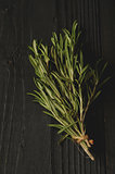Rosemary on wooden background