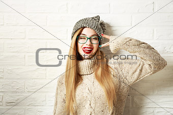 Funny Hipster Girl in Winter Clothes Going Crazy