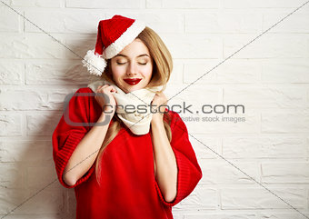 Smiling Christmas Girl in Red Winter Clothes
