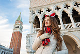 Young woman tourist spending Christmas holidays in Venice, Italy