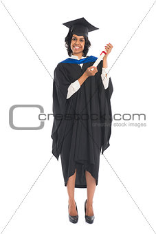 Portrait of a female graduate with her diploma