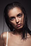 young adult woman with clean fresh skin and wet hair