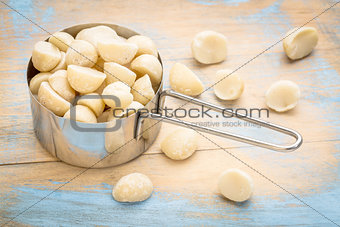 macadamia nuts in metal scoop