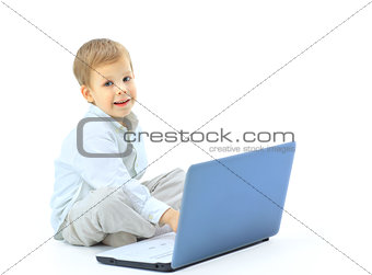 happy boy using the computer
