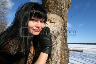 woman near tree. Winter's picture