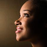 Profile of smiling young woman.