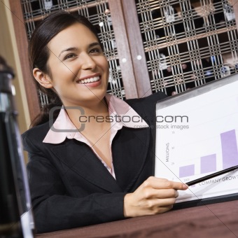 Businesswoman with chart.