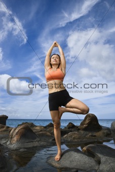 Woman in tree pose