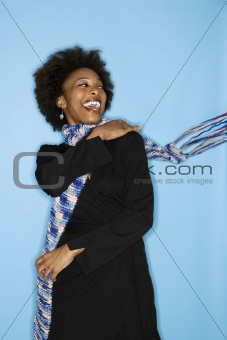 Woman flinging scarf