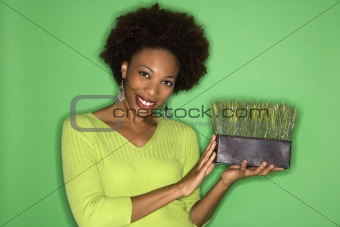 Woman holding grass