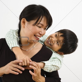 Son hugging mother