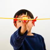 Boy with toy plane
