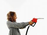 Angry woman with gas nozzle