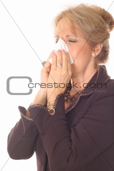 shot of a Business woman sneezing