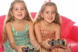 shot of children playing video games upclose