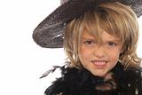 shot of a young child in a wig & hat