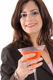 shot of a woman in suit having cocktail upclose